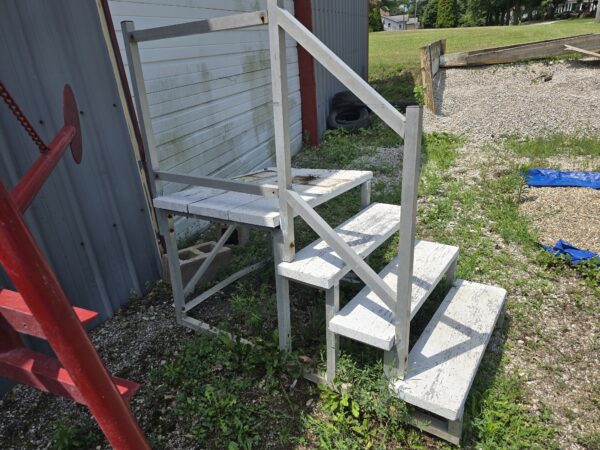 Aluminum and wood stairs formerly used with dunk tank